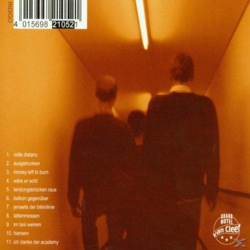 Albumcover mit zwei Personen, die in einem Tunnel gehen. Text auf Deutsch.