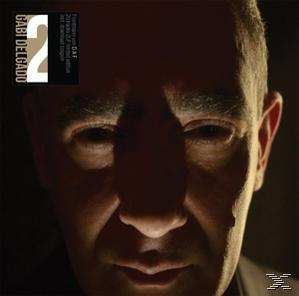 Albumcover, das Gesicht eines Mannes im Schatten.
