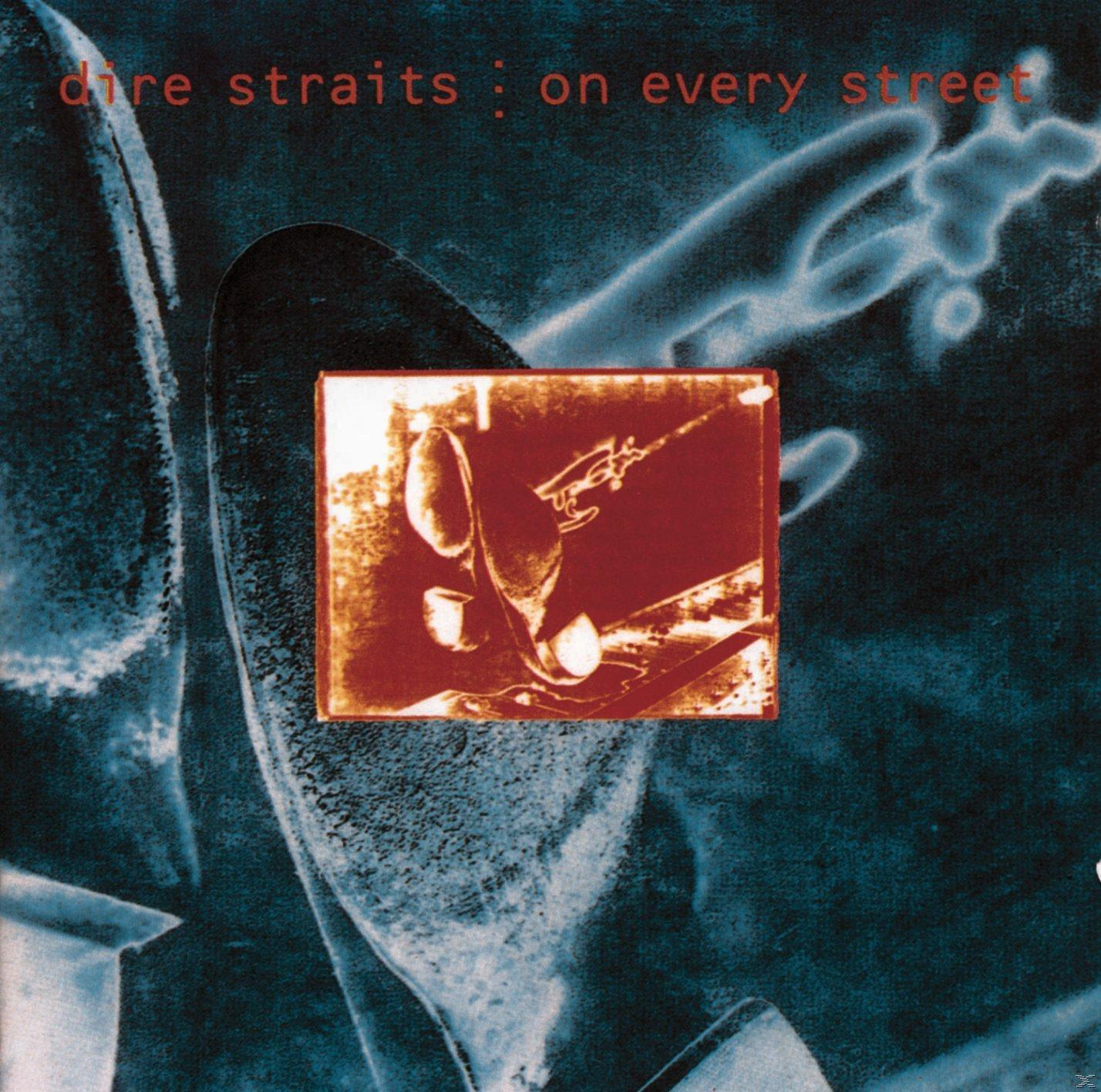 Dire Straits Albumcover mit einem Schuh auf blauem Hintergrund und einem roten Quadrat mit Kunst.