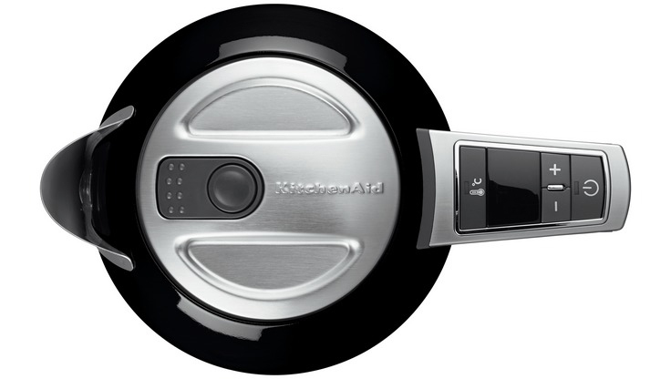 Top view of a black and silver electric kettle with controls and a handle.