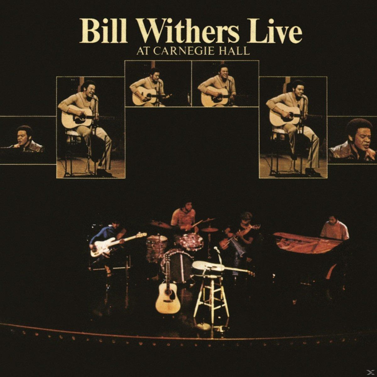 Bill Withers Live Albumcover. Bühne mit Band, Fotos von Withers. Dunkler Hintergrund.