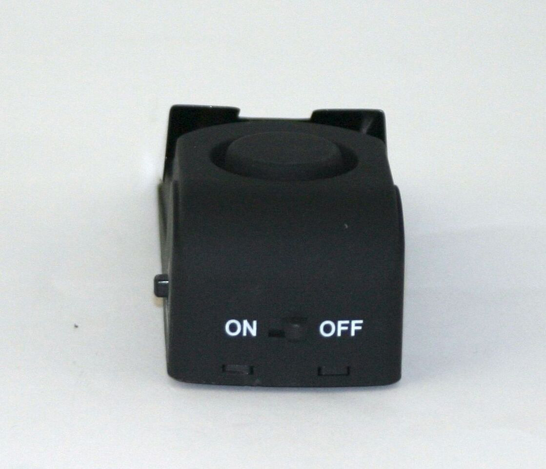 Schwarzes elektronisches Gerät mit 'ON' und 'OFF'-Beschriftungen. Ein Schalter in der Mitte und ein runder Knopf.