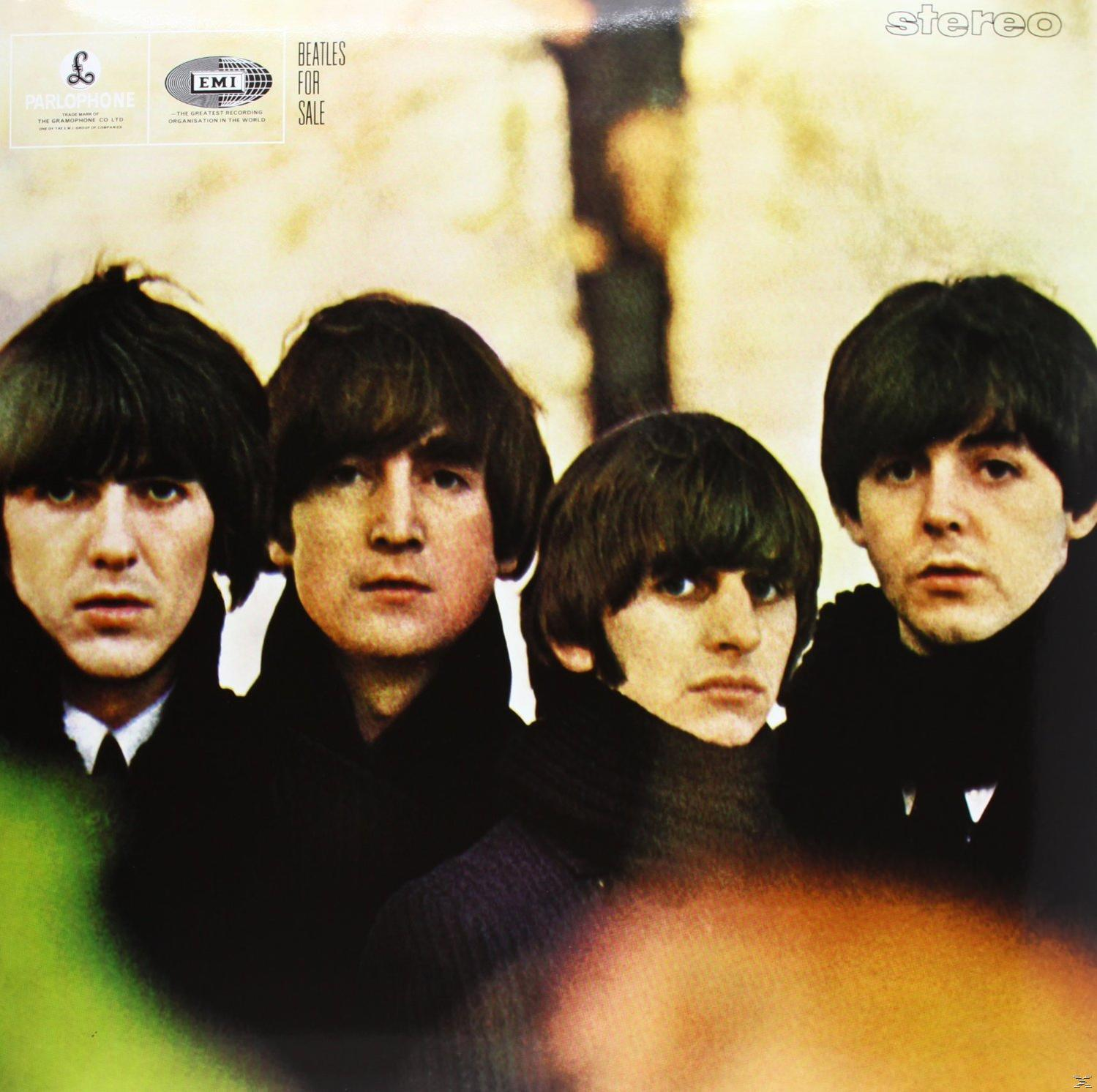 Beatles-Albumcover, vier Männer blicken nach vorne, schwarz-weiß mit gelbem Hintergrund.