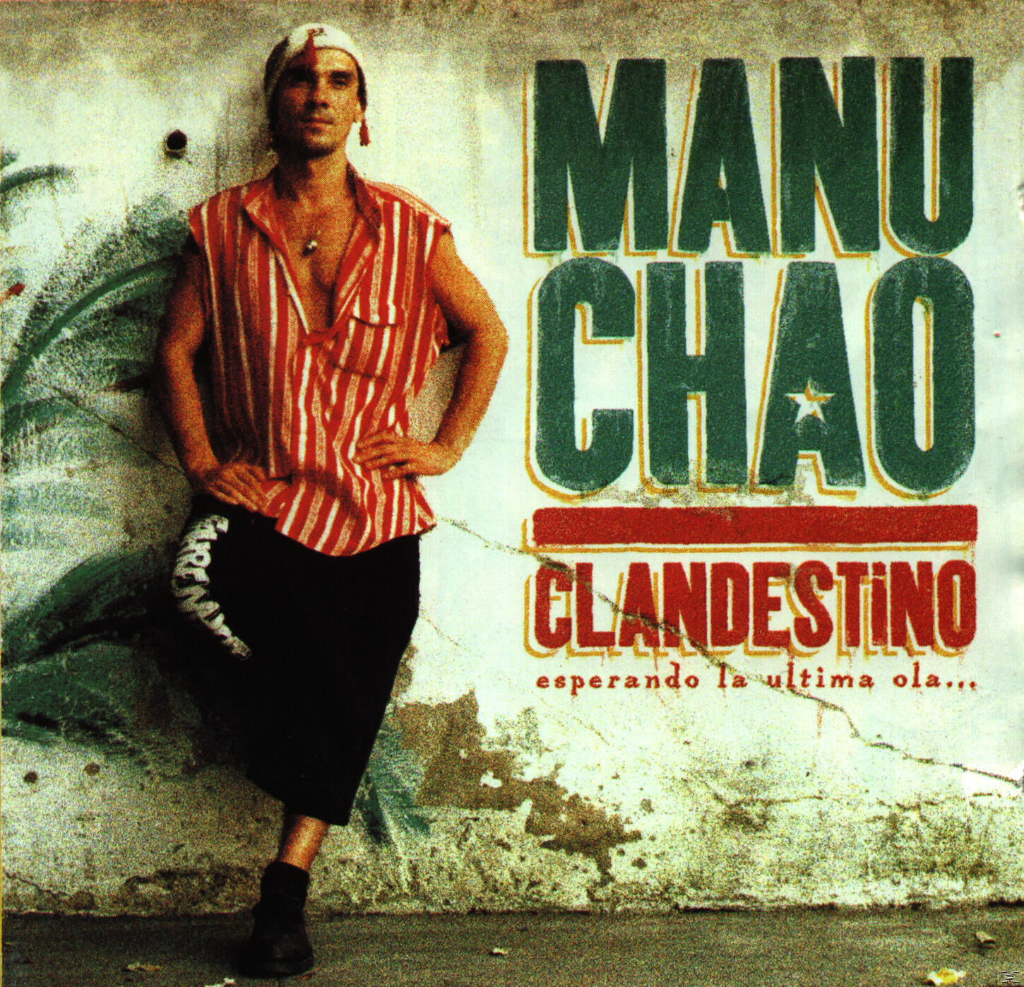 Albumcover, ein Mann mit einem rot-weiß gestreiften Hemd. Titel: Clandestino.