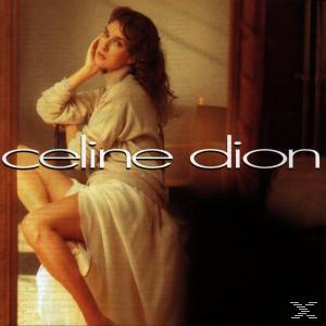Celine Dion album borító: nő bézs ruhában, ül. A logó és a név látható.