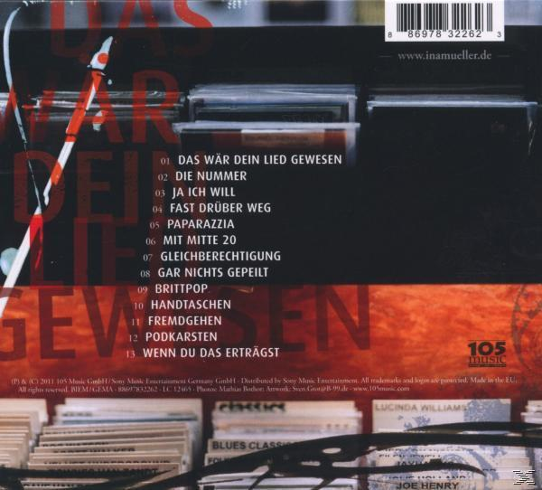 CD-Rückseite mit Titelliste auf Deutsch und CD-Stapeln im Hintergrund. Text auf Deutsch.