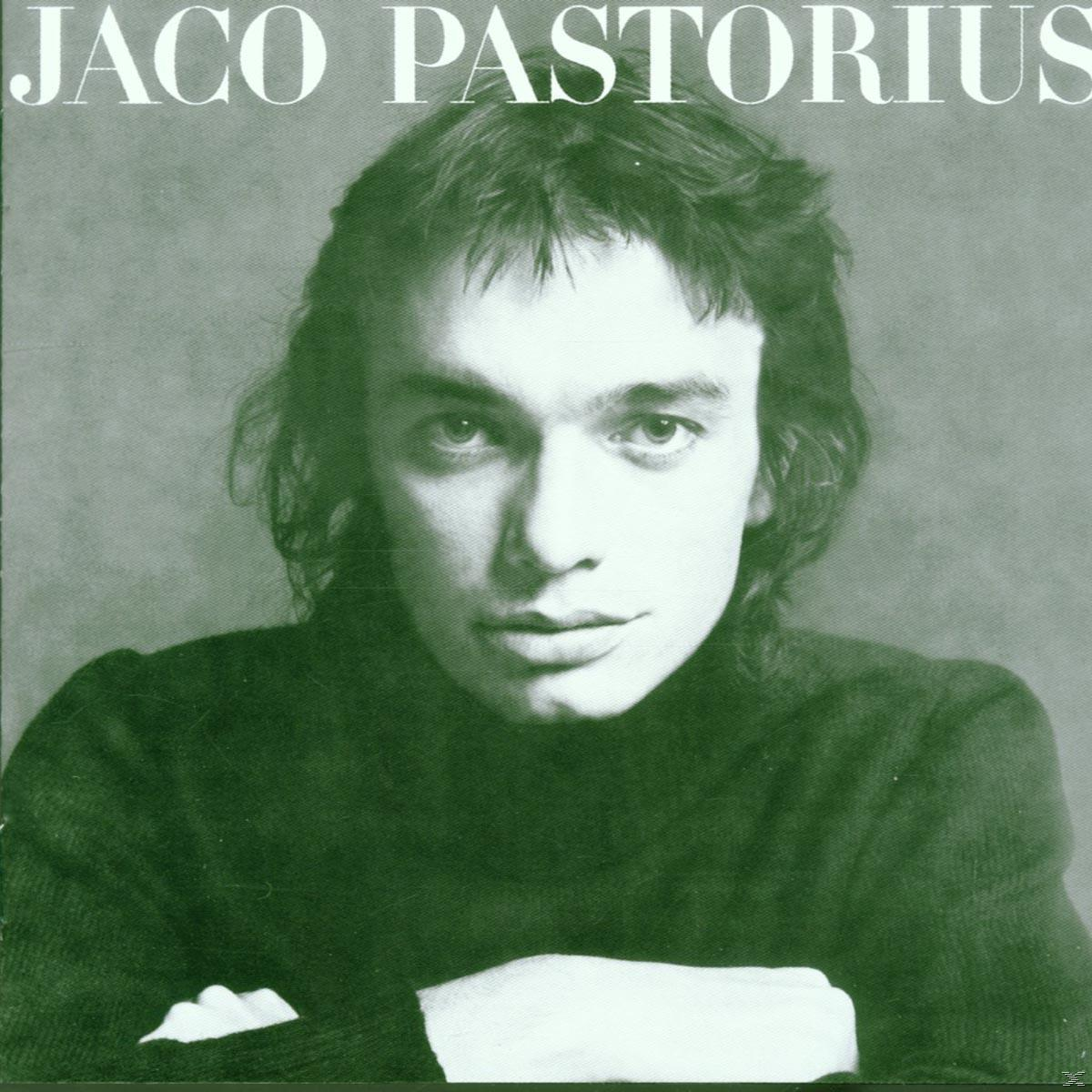 Albumcover: Jaco Pastorius Portrait, grün getönt. Dunkle Haare, ernster Ausdruck.