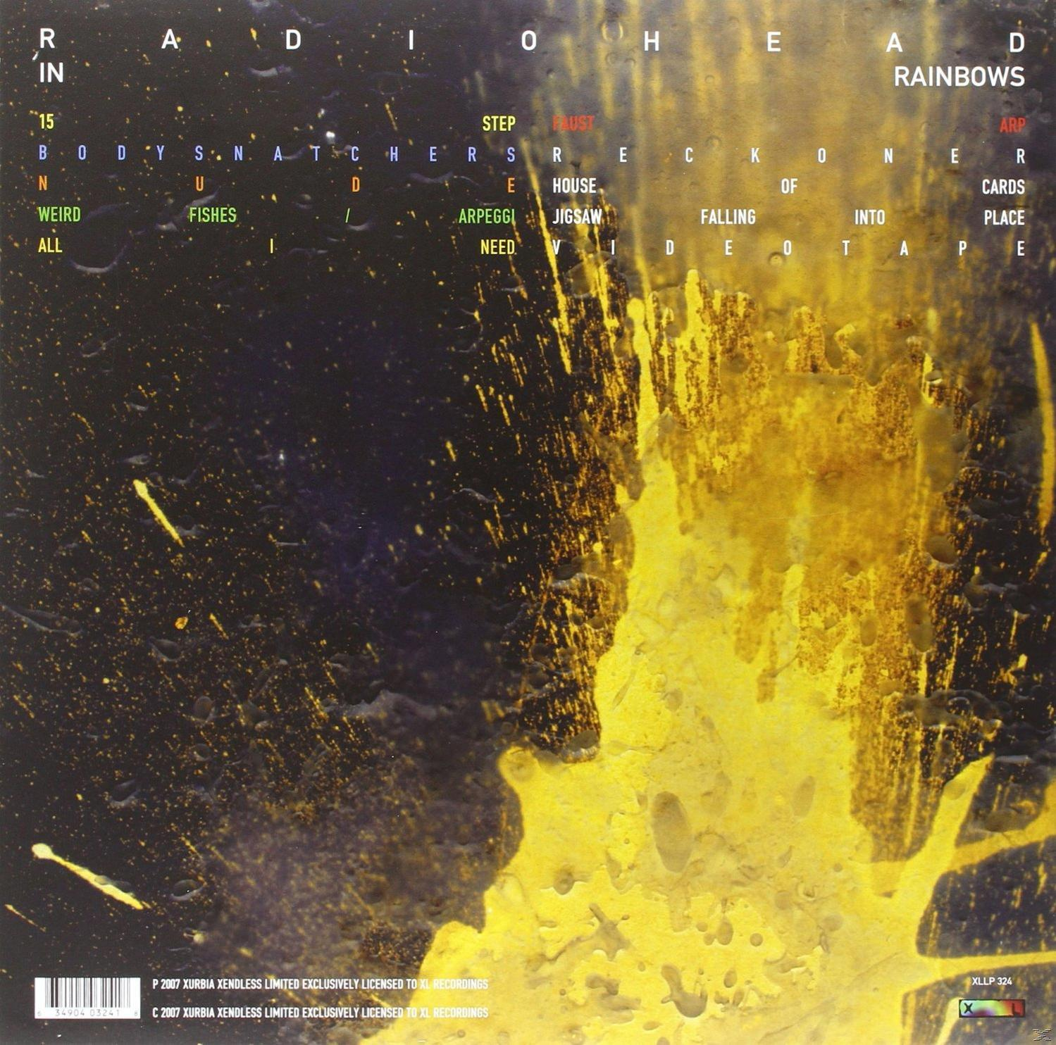 Albumcover, Radiohead, 'Rainbows', gelb-schwarze Farbkleckse, Trackliste an den Seiten.