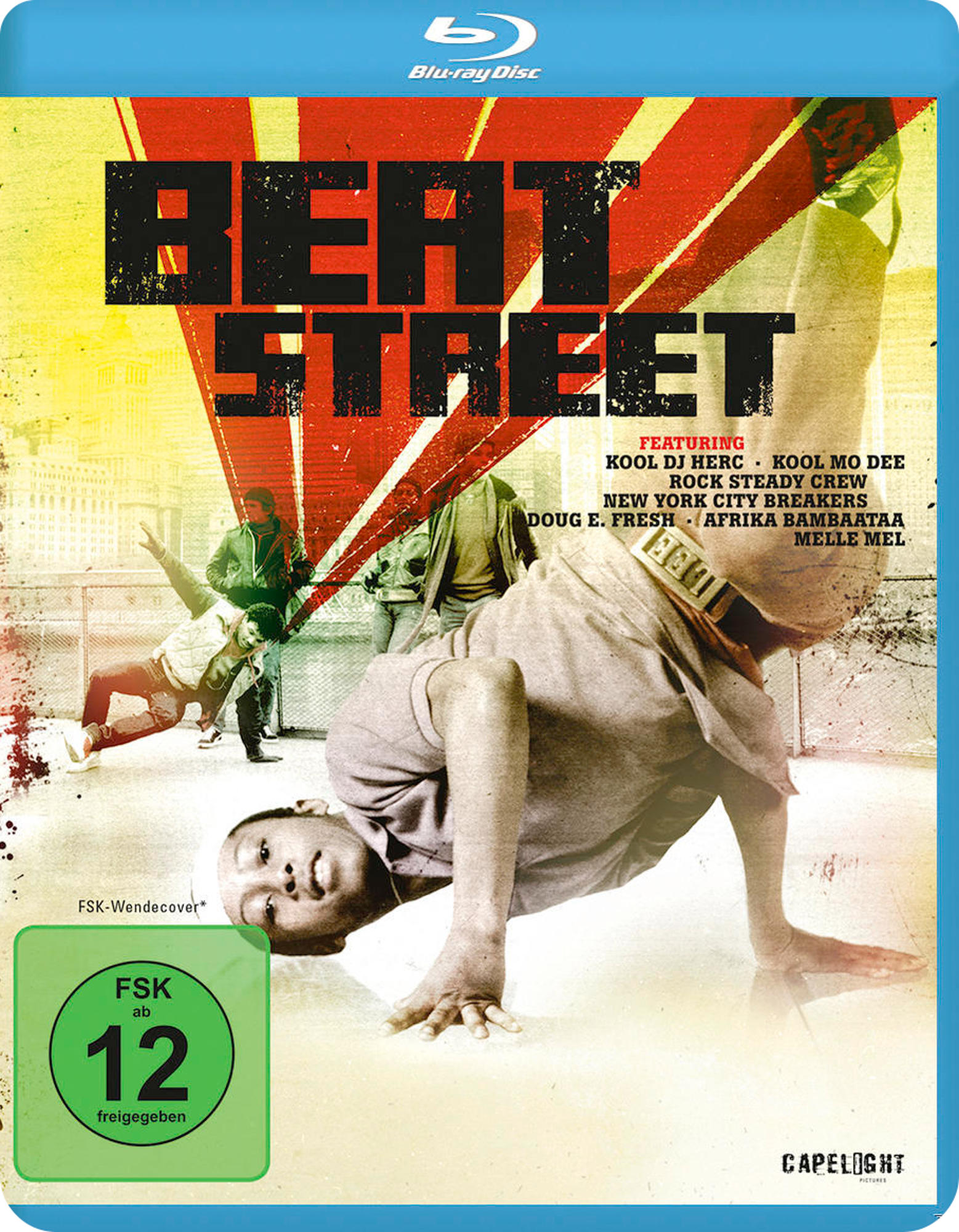 Beat Street Blu-ray-Cover. Zeigt Breakdancer in Aktion. Rotes, gelbes und schwarzes Farbschema.