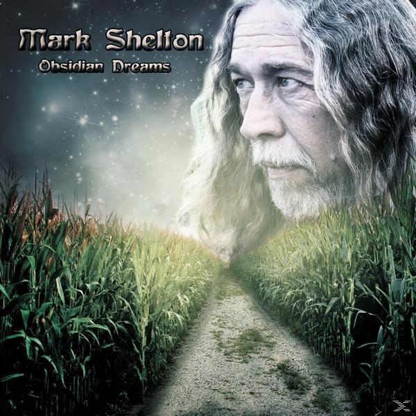 Albumcover mit dem Gesicht eines Mannes über einem Maisfeld mit einem Weg.