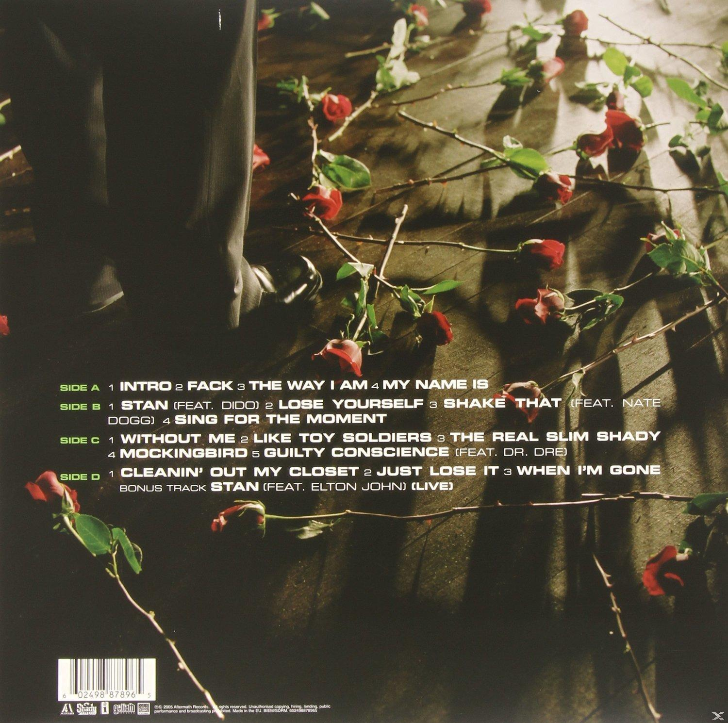 Schallplattencover mit roten Rosen und Beinen eines Mannes. Songtitel sind an den Seiten gelistet.