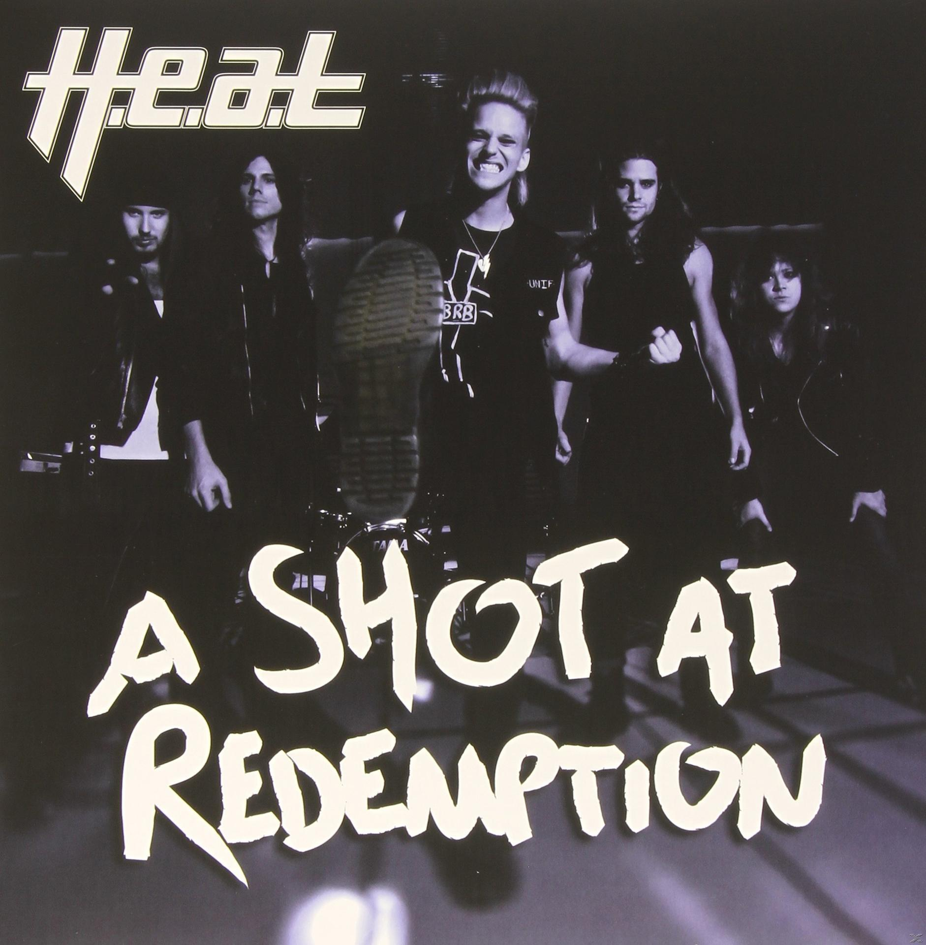 Albumcover einer Band in dunkler Umgebung. Text: Heat, A Shot At Redemption.