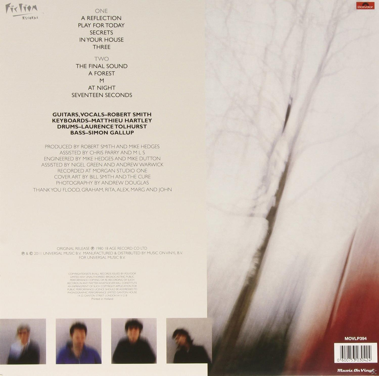 Album borító: egy havas tájkép. Szöveg: One, Two, Three, A Forest, M, Seventeen Seconds.