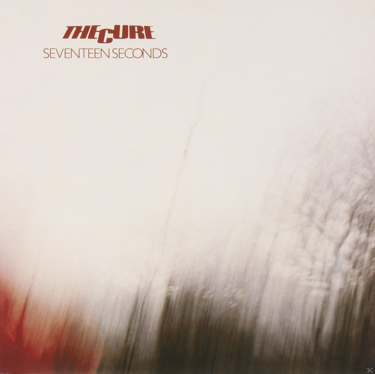 Album borító, The Cure, 'Seventeen Seconds', piros és fehér, elmosódott absztrakt kép.
