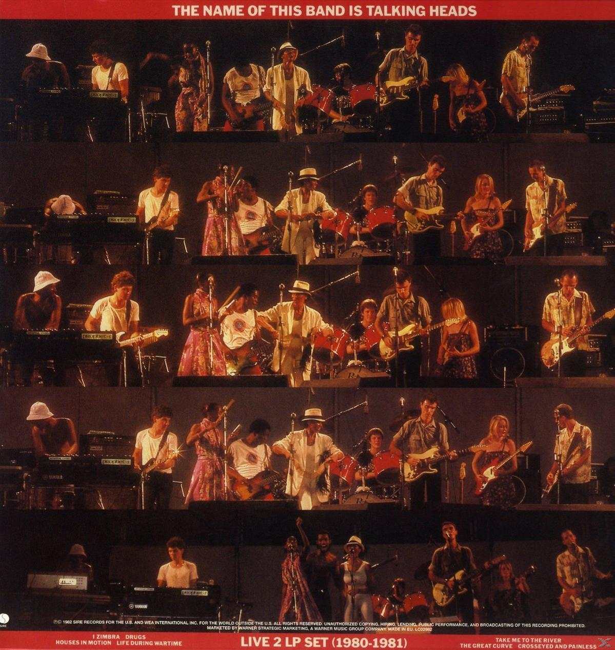 Talking Heads Band live auf der Bühne, mehrere Panels.