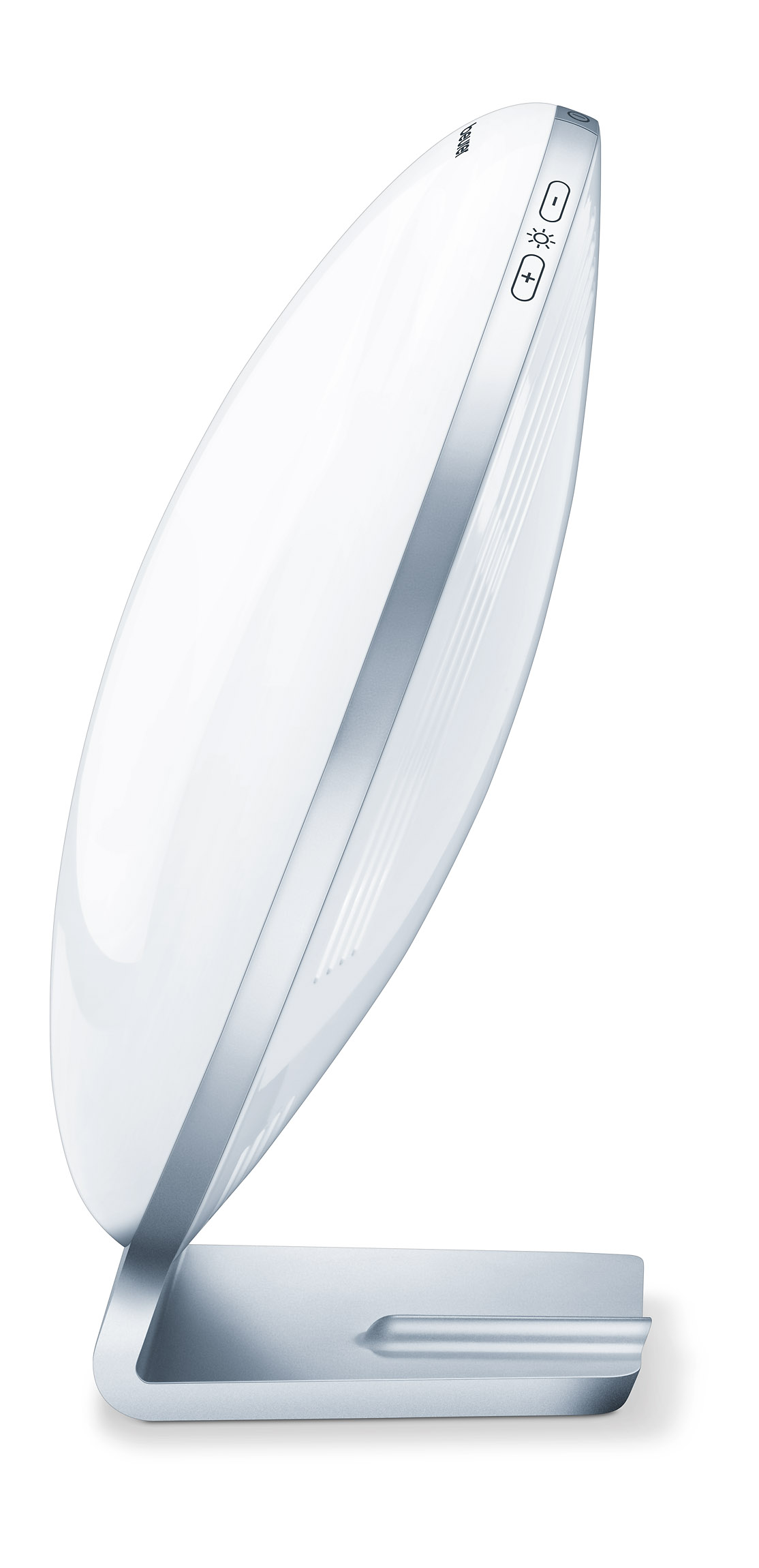 Une lampe de luminothérapie blanche avec un support argenté, légèrement inclinée sur un fond blanc.