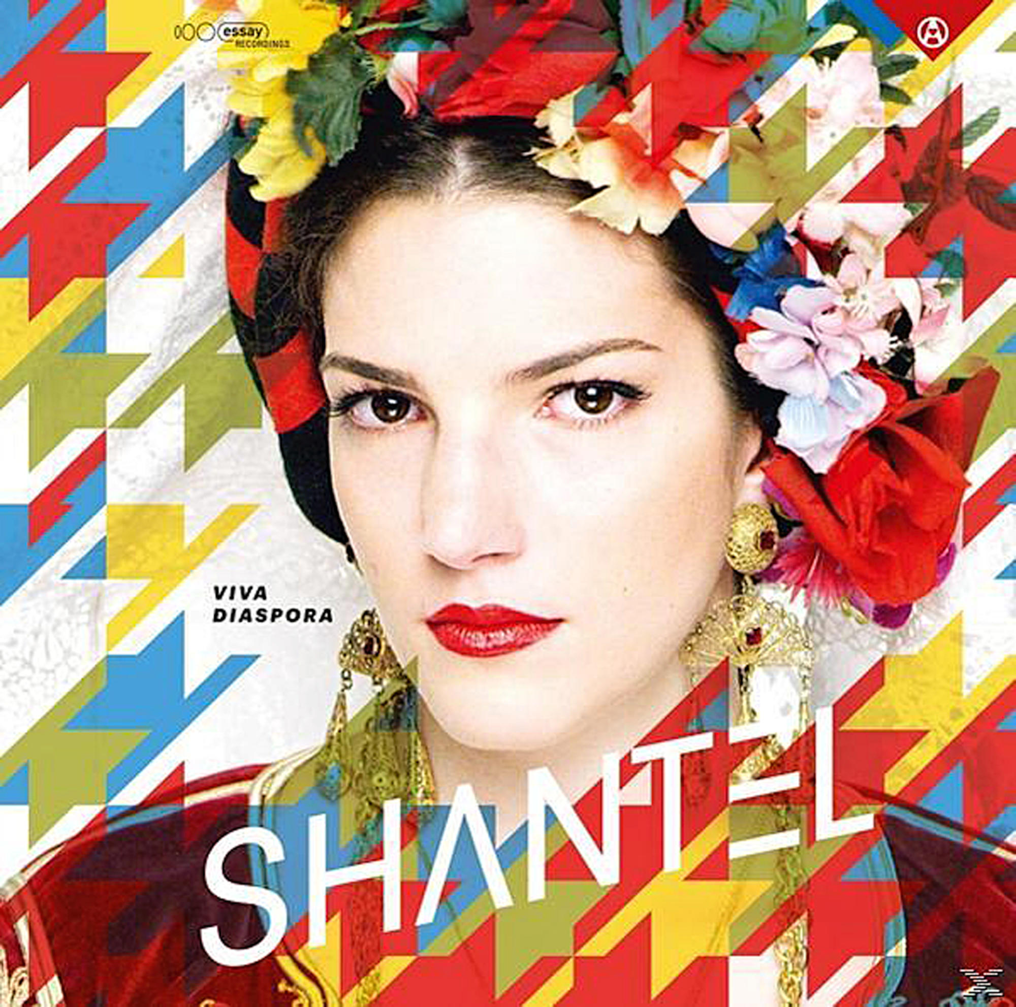 Albumcover mit einer Frau mit Blumenkranz und buntem Hintergrund.