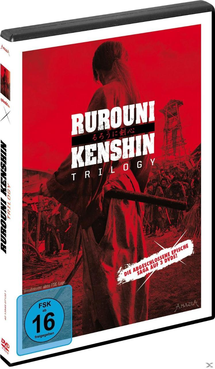 Rurouni Kenshin Trilogy DVD-Cover. Ein Mann mit Schwert auf rotem Hintergrund. Japanischer Text.