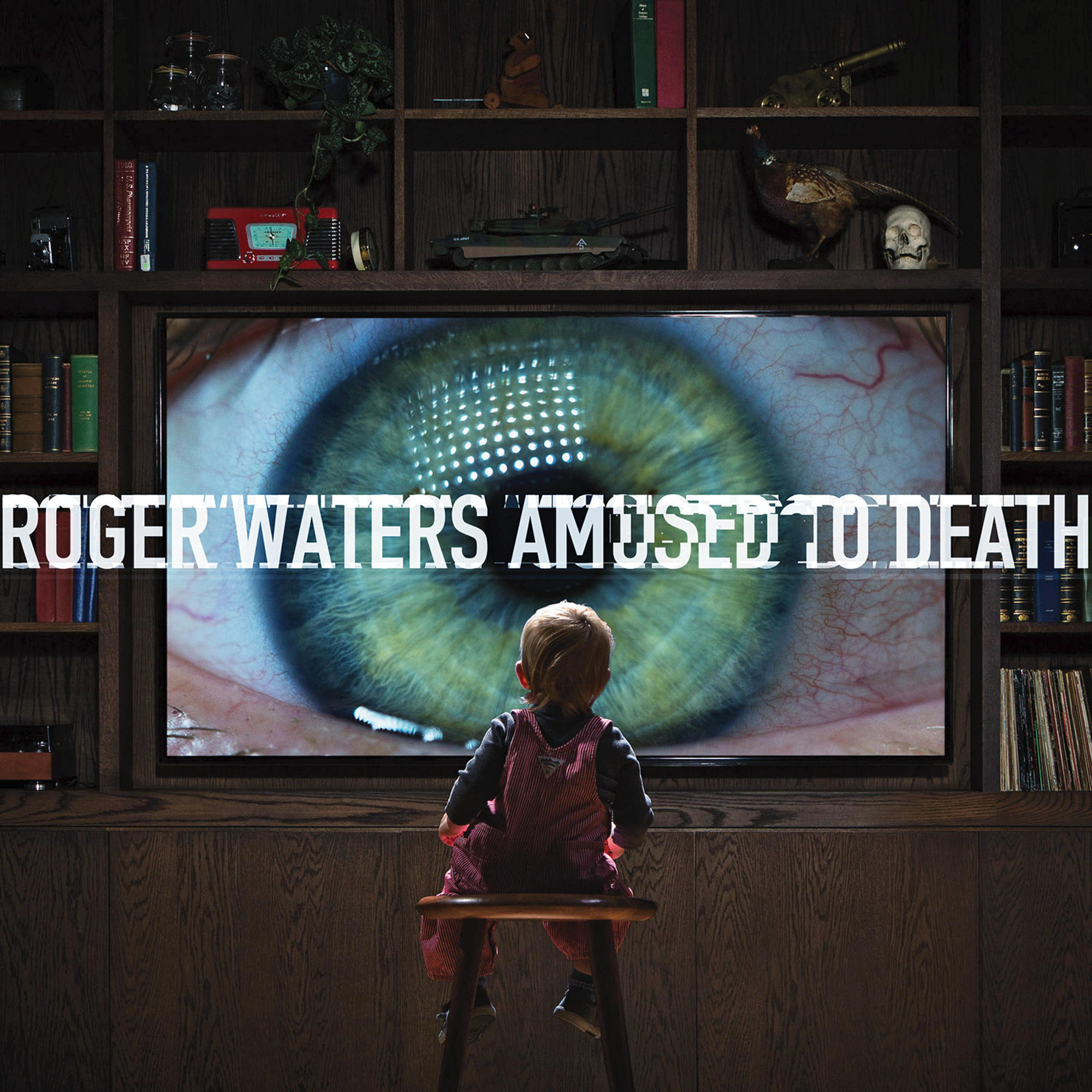 Albumcover mit Kind, das auf ein riesiges Auge auf einem Fernsehbildschirm blickt. Roger Waters.