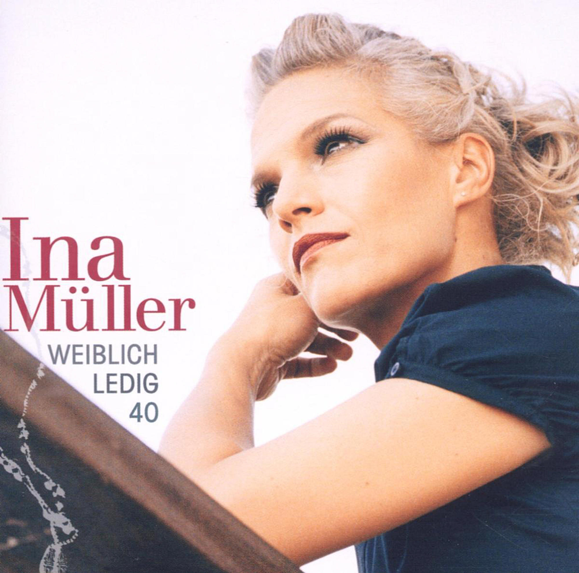 Frau mit blonden Haaren blickt nach rechts, Albumcover.