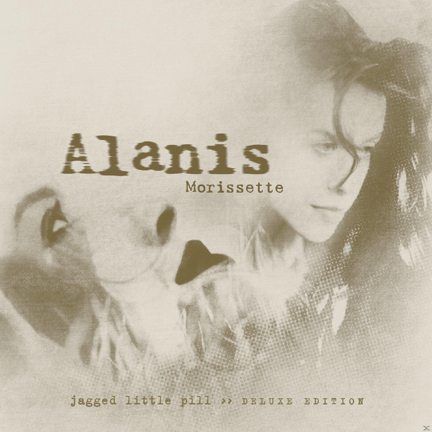 Alanis Morissette Albumcover mit ihrem Gesicht und Titel.