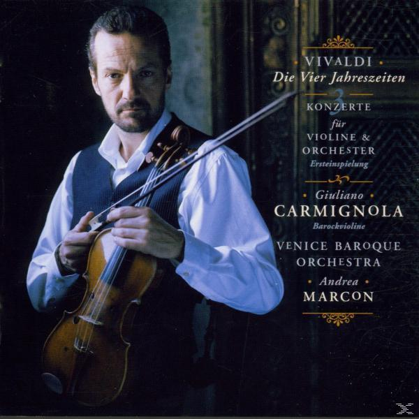 Egy férfi album borítója, aki hegedűt tart. Cím: Vivaldi, Die Vier Jahreszeiten. Előadó: Giuliano Carmignola.