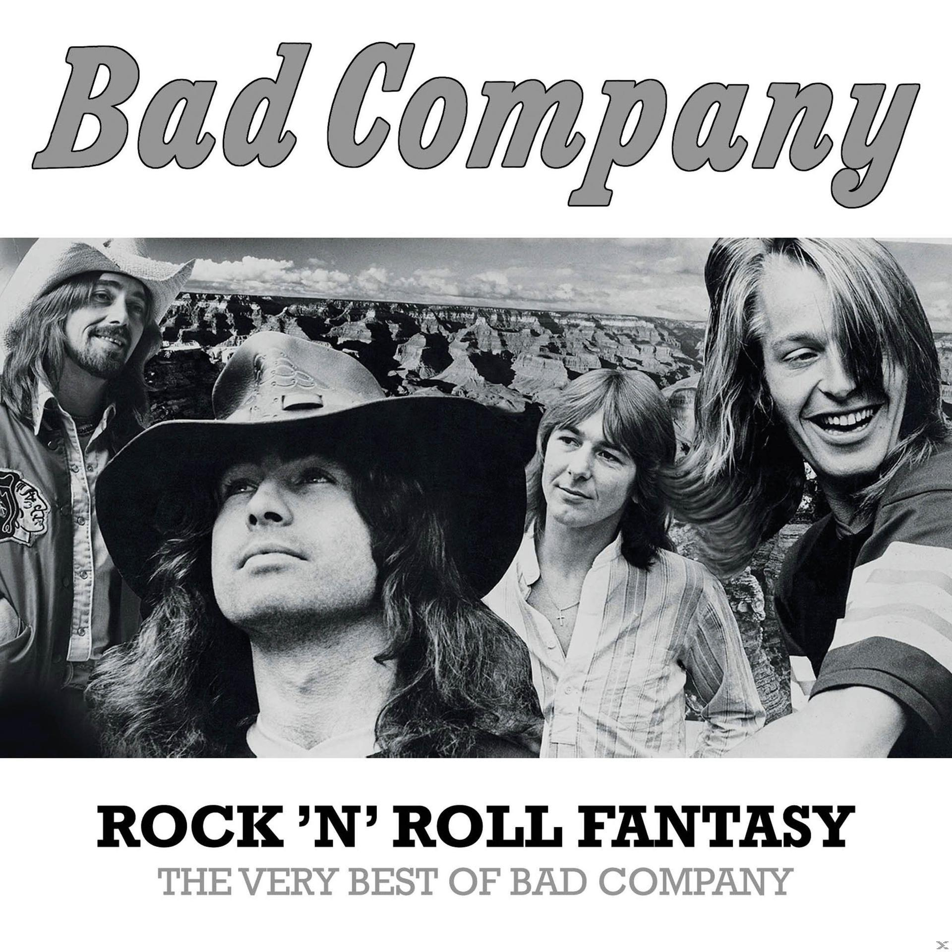 Albumcover mit Bandmitgliedern und dem Titel "Rock 'n' Roll Fantasy" auf einem Schwarz-Weiß-Bild.