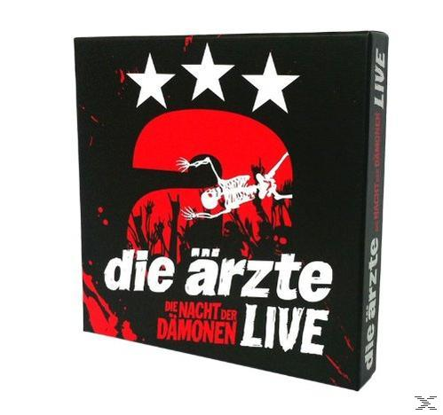 Albumcover mit drei Sternen und der Zahl 2. Auf rotem Grund ein Skelett.