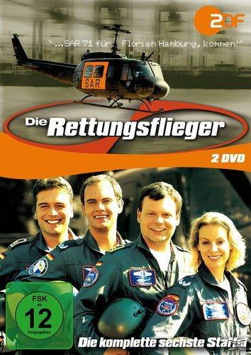 DVD-Hülle mit Hubschrauber und vier Schauspielern.