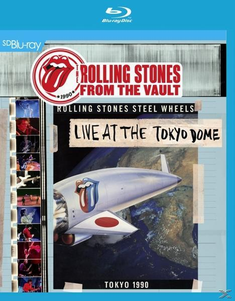 Blu-ray-Cover: Rolling Stones live in Tokio 1990. Mit einer Rakete mit dem Bandlogo.