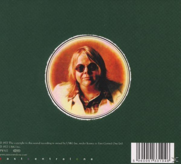 CD-Cover mit Mann in Sonnenbrille und grünem Hintergrund.