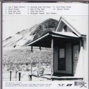 Album-Rückseite: Schwarz-Weiß-Foto eines Hauses. Trackliste und Albumdetails sind ebenfalls abgedruckt.