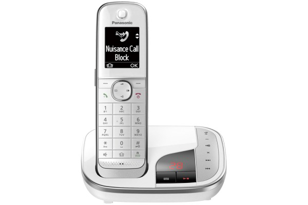 Ein weißes schnurloses Telefon mit einem Bildschirm, auf dem "Nuisance Call Block" angezeigt wird, und einer Basis.