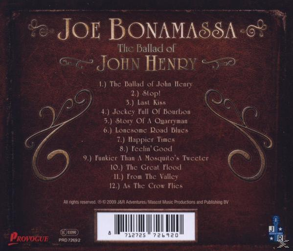 Joe Bonamassa 'The Ballad of John Henry' című CD-jének borítója a számlistával és barna bőr háttérrel.