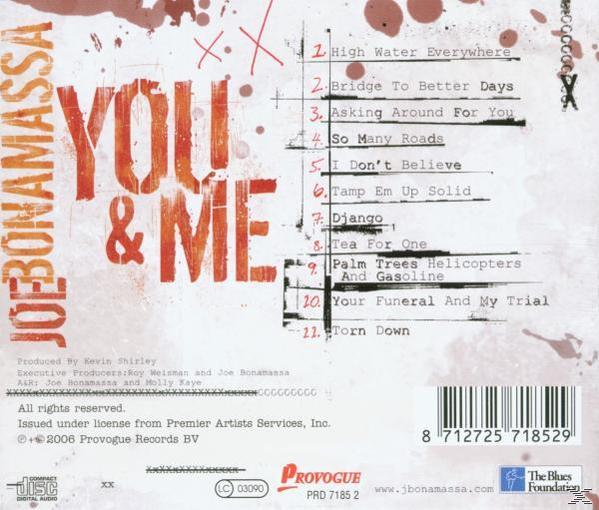 Album hátlap: A 'You & Me' album számlistája piros és fehér dizájnnal.