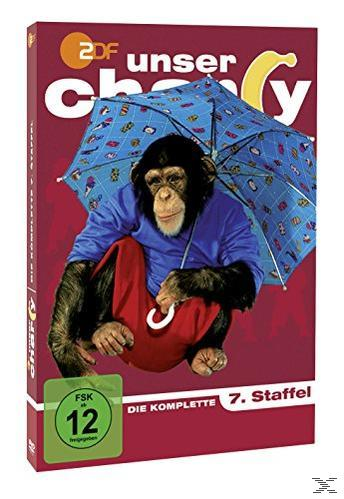 Ein Schimpanse, in blauem Hemd und roter Hose, hält einen Schirm auf einem DVD-Cover. Text: 'Unser Charly' und '7. Staffel'.