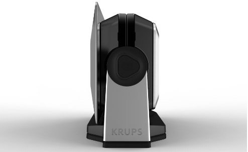 Side view of a Krups waffle maker. It is black and silver, with a handle and a square shape.