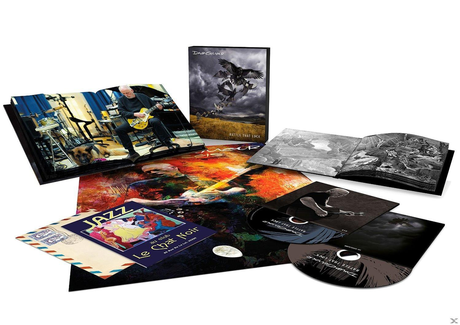 Albumkészlet egy gitározó férfiról szóló könyvvel, CD-kkel és műalkotásokkal. A borítón madarak vannak. Más borítók jazzt és egy macskát mutatnak.