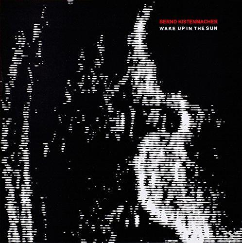 Albumcover, schwarzweiß, mit einer weiß umrandeten Grafik und dem Titel 'Wake Up In The Sun'.