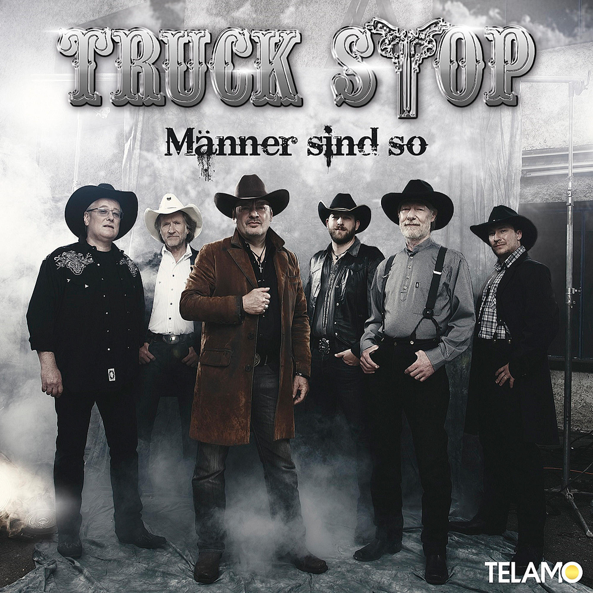 Albumcover mit sechs Männern in Cowboyhüten, die vor einer Kulisse stehen.