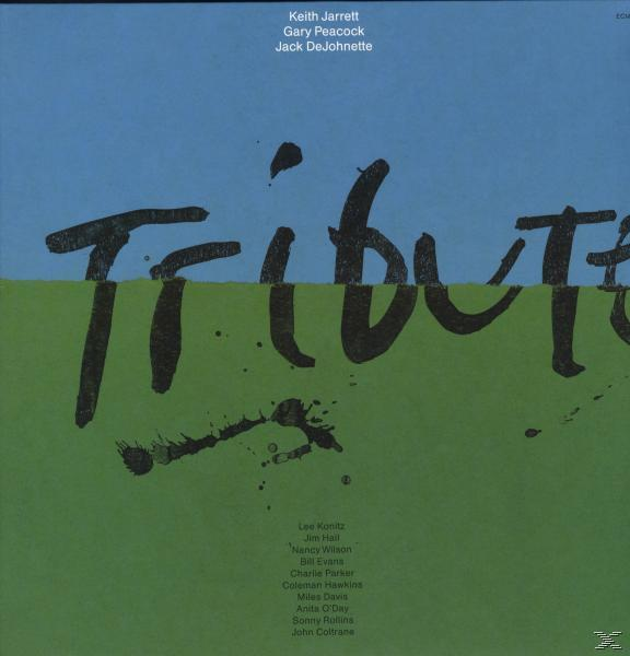 A 'Tribute' album borítója, absztrakt formákkal és szöveggel.