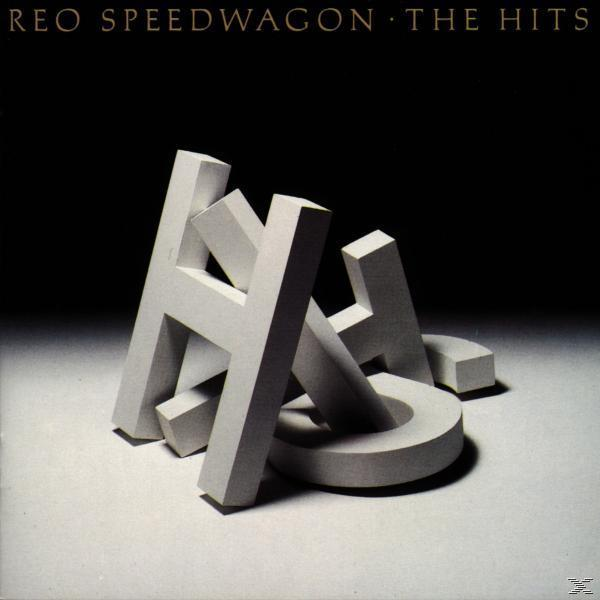Albumcover von REO Speedwagon - The Hits. Weiße, 3D-Buchstaben 'HITS' auf weißer Oberfläche vor schwarzem Hintergrund.