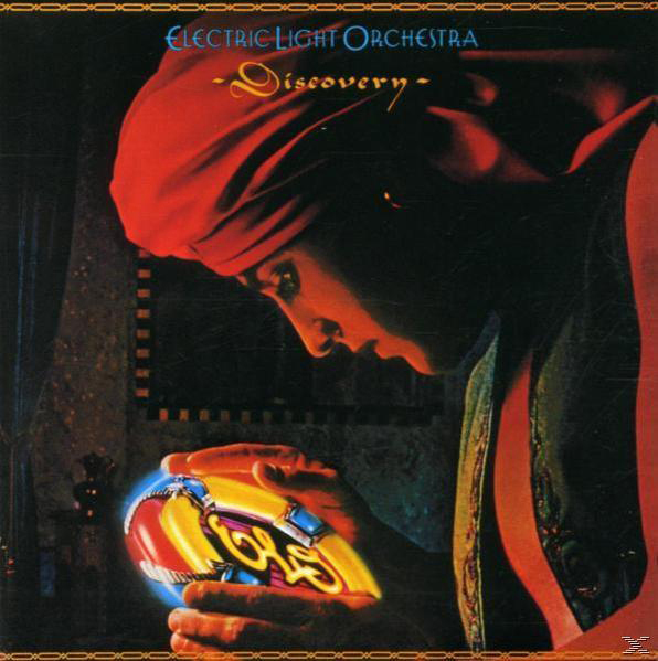 Albumcover mit einem Mann mit rotem Kopftuch, der eine leuchtende Kugel hält. Der Text lautet 'Discovery' von ELO.