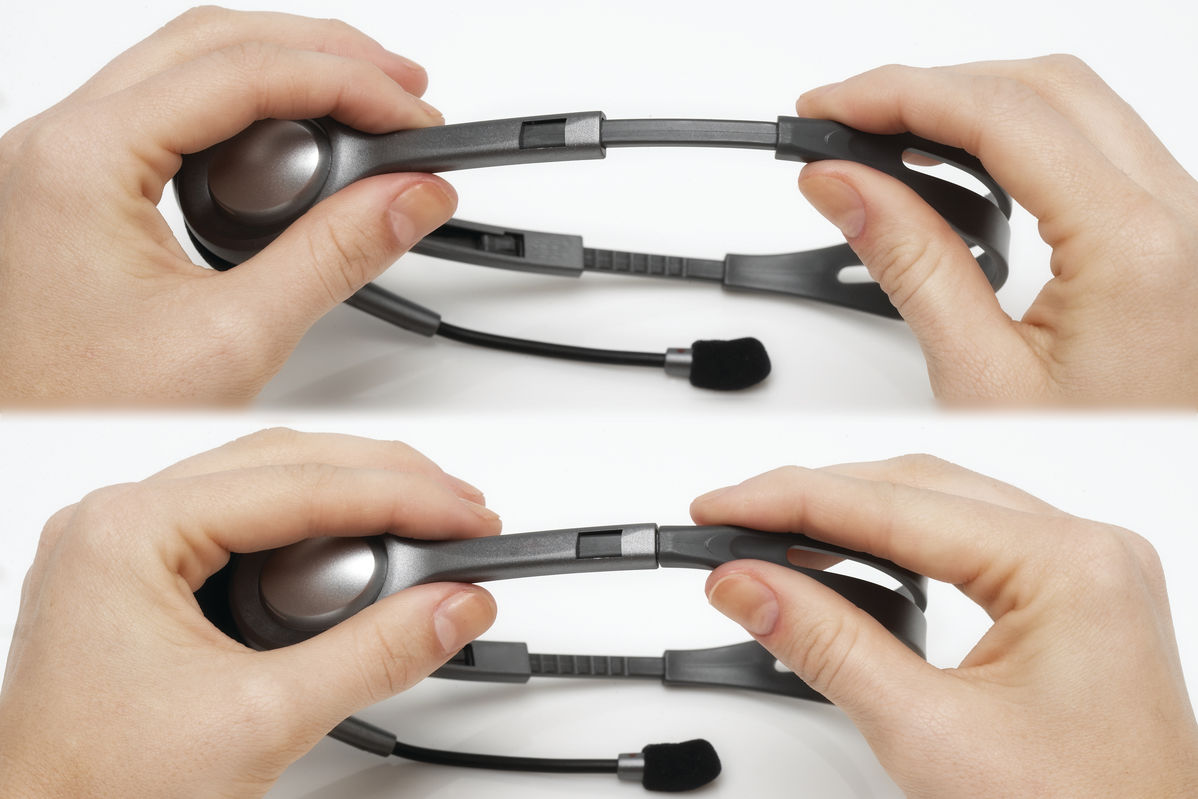 Two images of a headset being adjusted by hands. Grey headset, black mic, white backdrop.