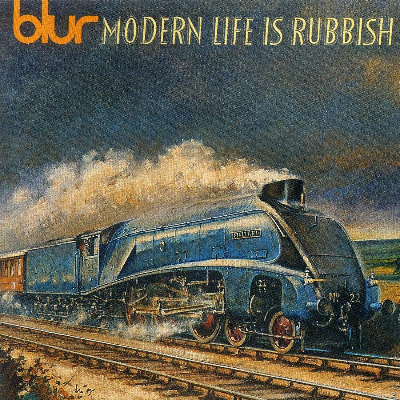 Album borító: 'Modern Life Is Rubbish' a Blurtól, kék gőzmozdonnyal a síneken.