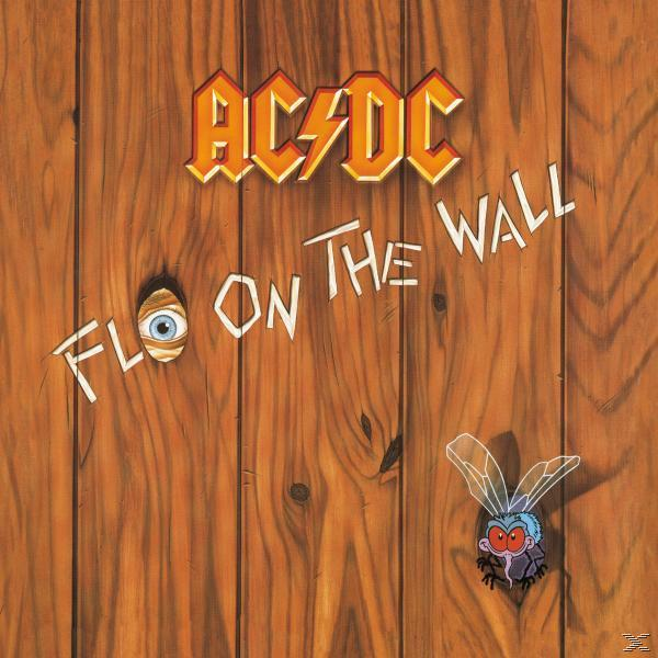 AC/DC Albumcover, 'Fly on the Wall'. Hintergrund aus Holzwand, Auge in einem Loch, Cartoon-Fliege.