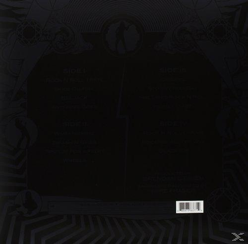 Schwarze Vinyl-Rückseite mit Titellisten in weißem Text und künstlerischem Design.