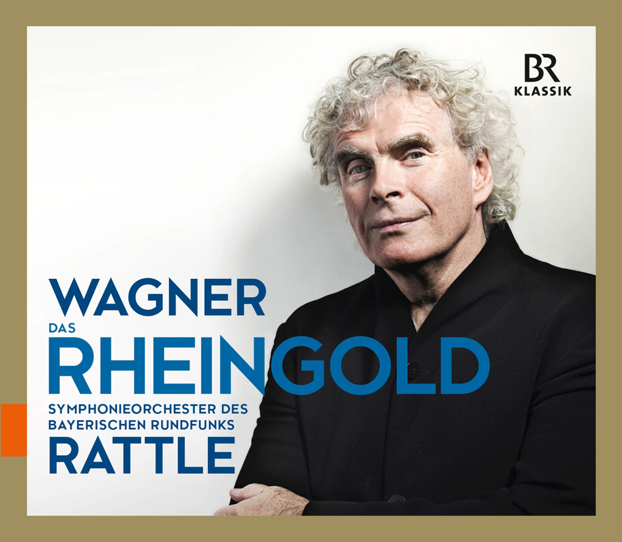 Albumcover: Ein Mann mit grauem Haar und schwarzer Jacke, mit goldenem Text 'WAGNER'. 'RATTLE' ist ebenfalls sichtbar.