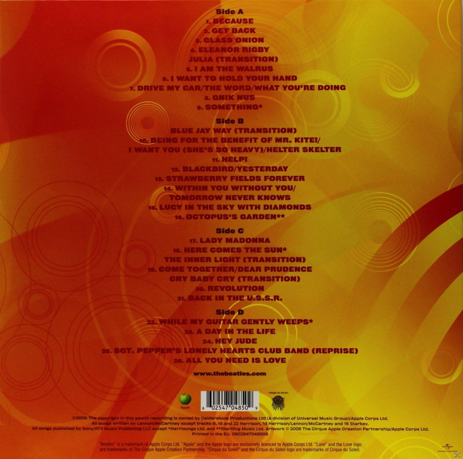 Albumhoes, witte tekst op beige achtergrond. Tracklist van Beatles-album, inclusief liedjes als 'Something'.