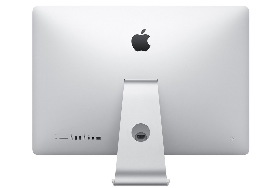 Rückansicht eines silbernen iMac-Computers mit Apple-Logo, Anschlüssen und Stromanschluss.